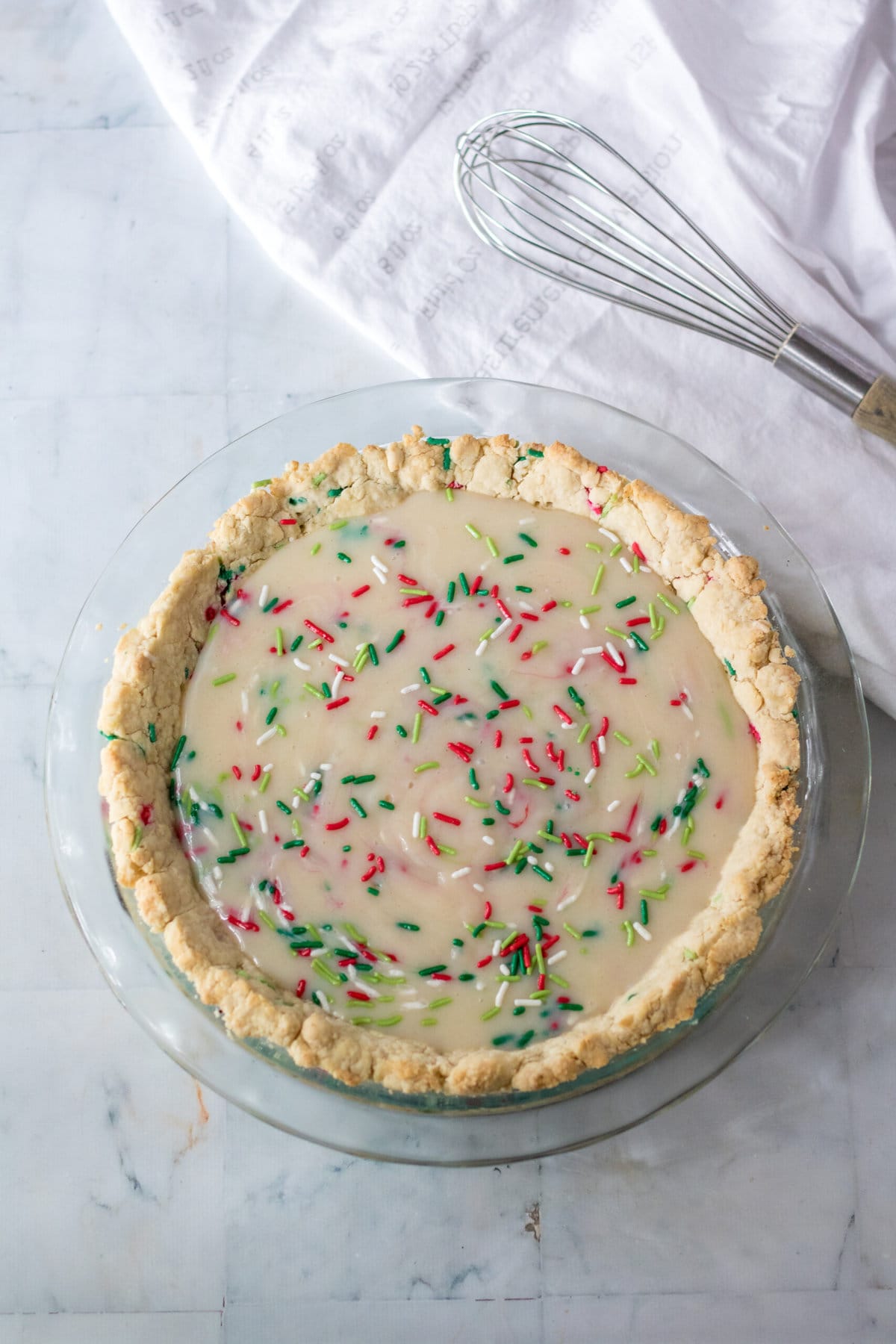 Adding the batter to the crust.